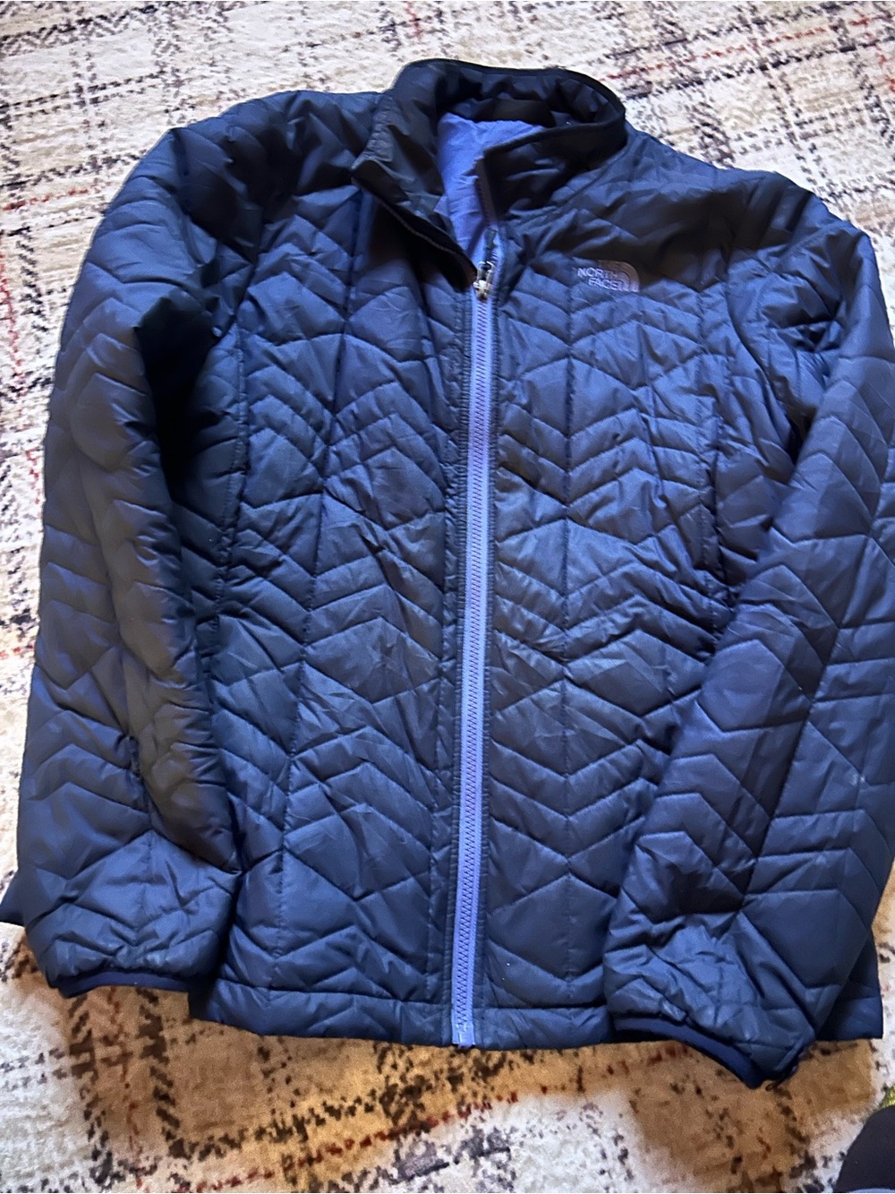 The North Face women’s Blue Quilted Puffer Jacket